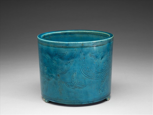 孔雀綠釉雙龍戲珠紋三足爐