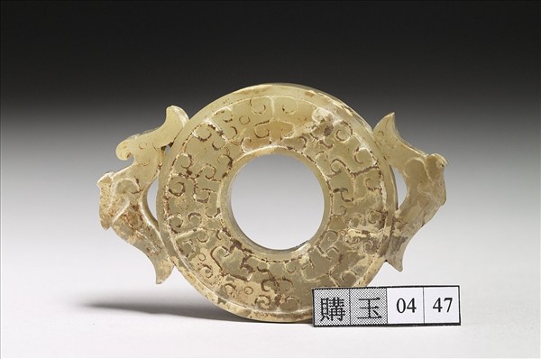 玉雙鳥紋出廓系璧