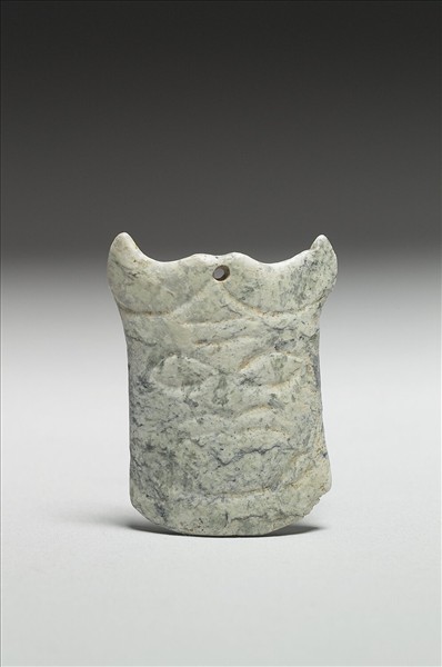 玉獸面紋弧形佩