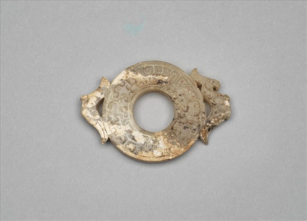 玉雙鳥紋出廓系璧