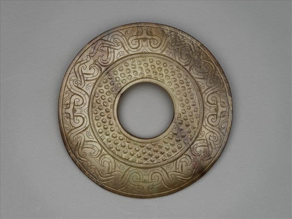 玉雙身獸紋璧（紋飾後加）