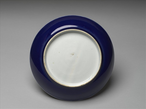 霽青釉白裡雙龍紋盤