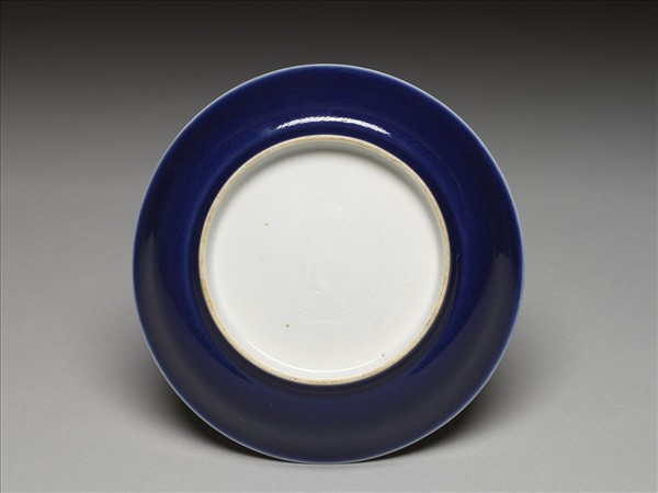 霽青釉白裡雙龍紋盤