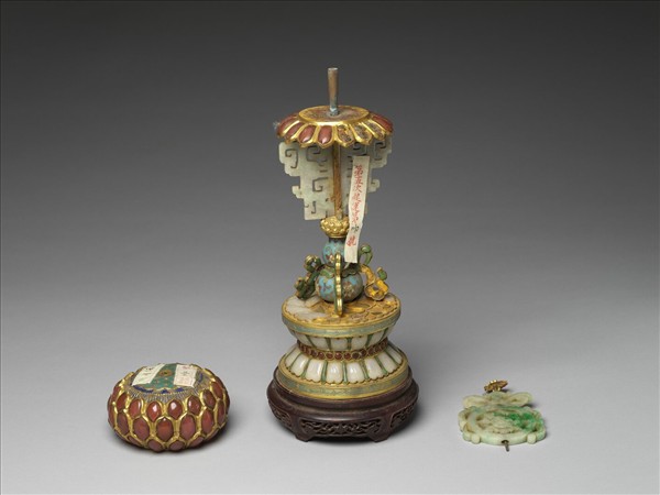 銅鍍金嵌玉及料石八寶（法輪）