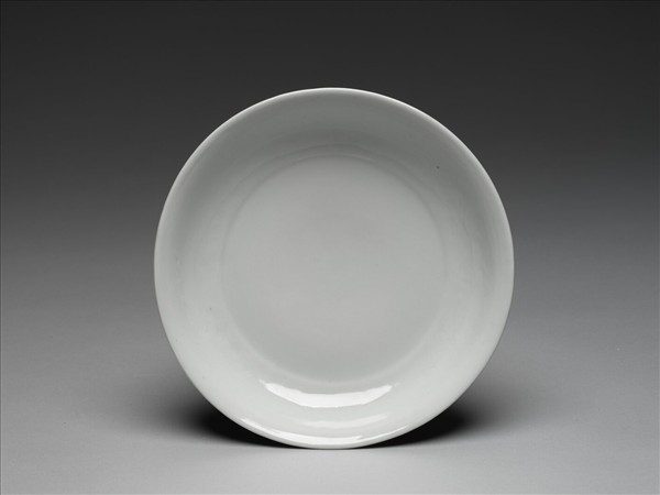 霽青釉白裡龍紋盤