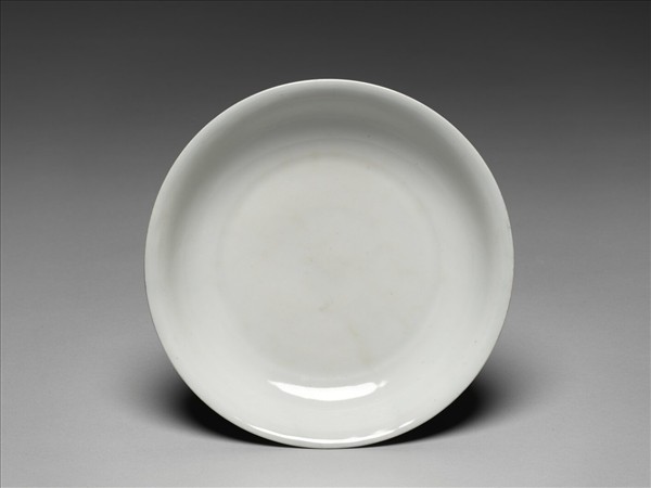 霽青釉白裡龍紋盤