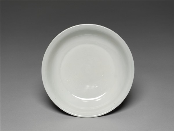 霽青釉白裡龍紋盤