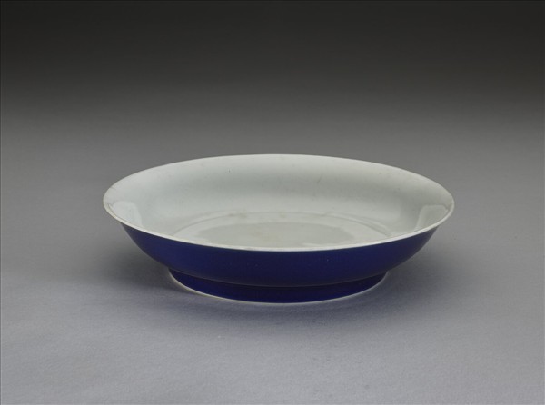 霽青釉劃花雙龍紋白裡盤