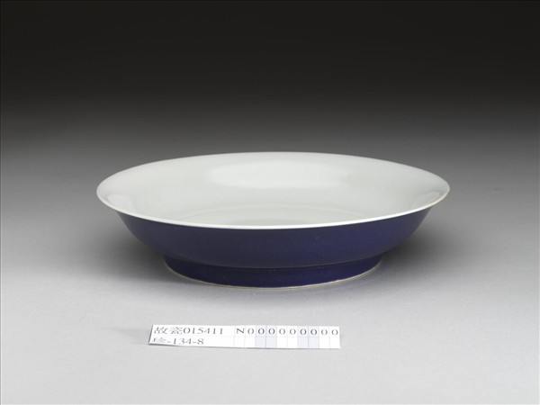 霽青釉劃花雙龍紋白裡盤