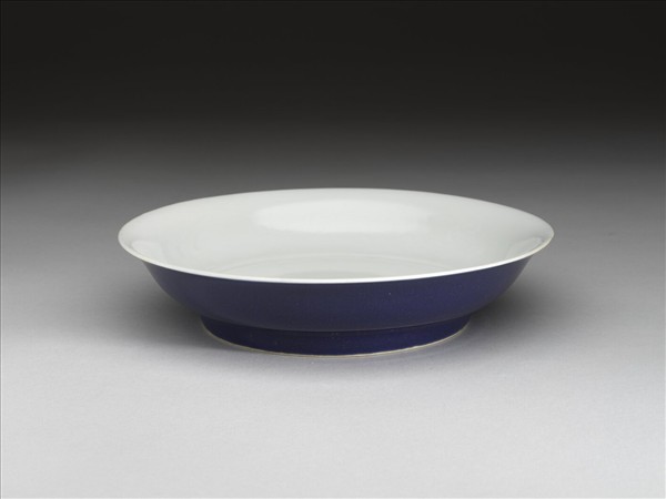 霽青釉劃花雙龍紋白裡盤