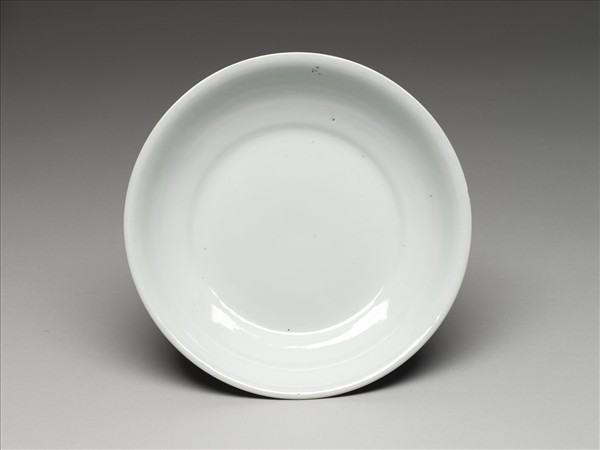 霽青釉白裡龍紋盤