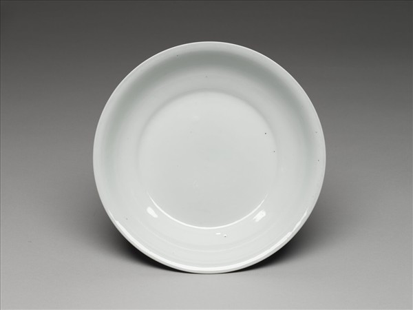 霽青釉白裡龍紋盤