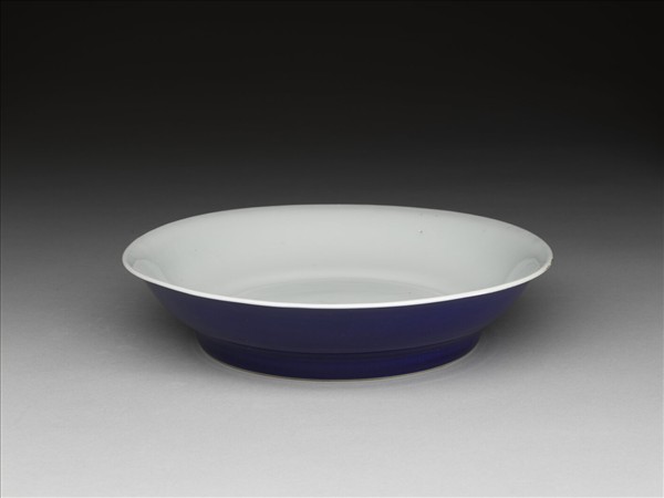 霽青釉白裡龍紋盤