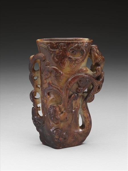 九螭角杯形花插