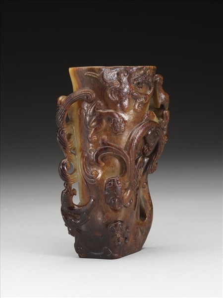 九螭角杯形花插