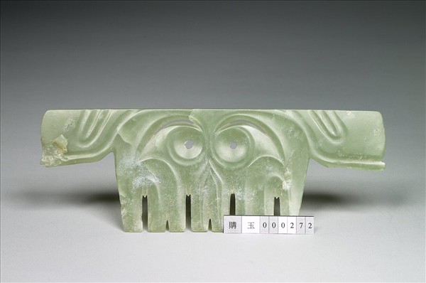 玉帶齒動物面紋飾片