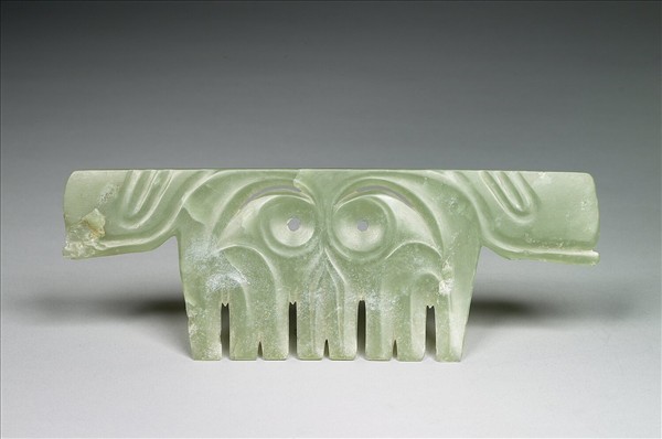 玉帶齒動物面紋飾片