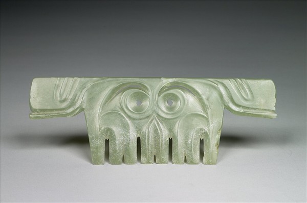 玉帶齒動物面紋飾片