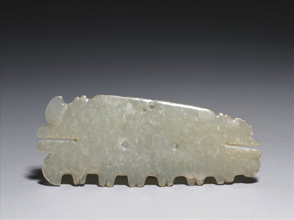 玉帶齒動物面紋飾片