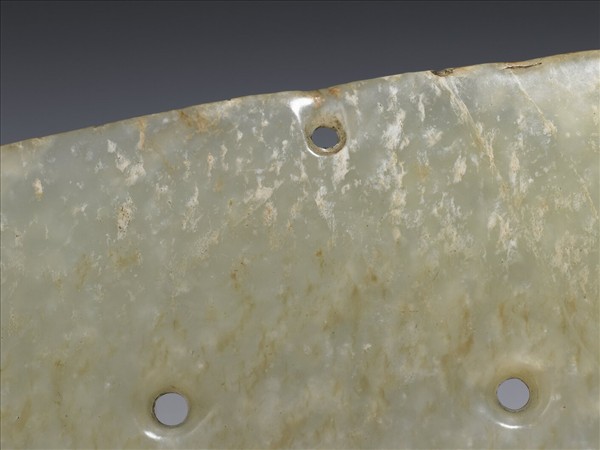 玉帶齒動物面紋飾片