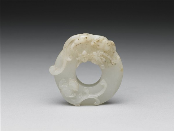 雙螭乳丁紋玉璧