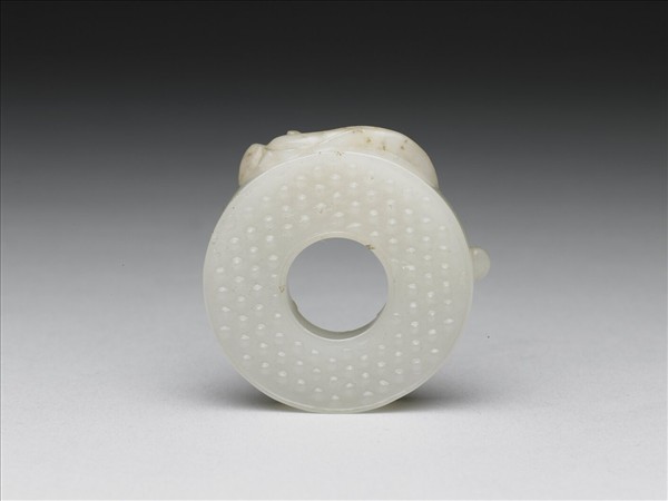 雙螭乳丁紋玉璧