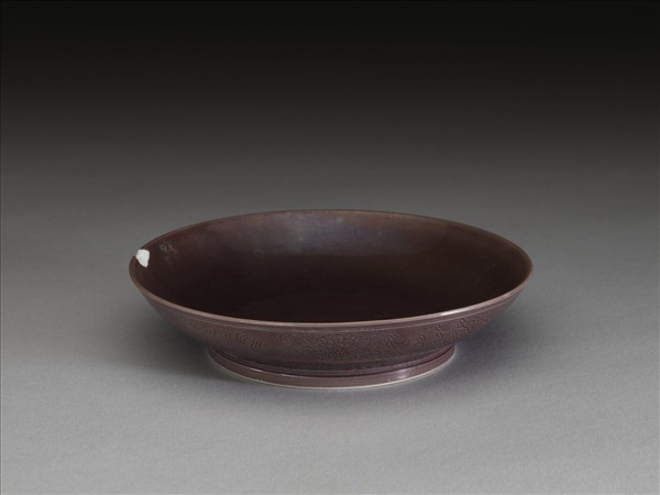 茄皮紫釉八寶紋盤