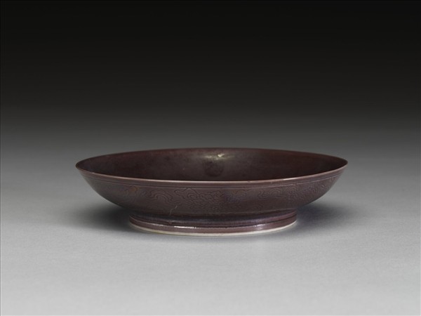 茄皮紫釉八寶紋盤