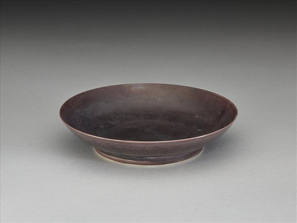 茄皮紫釉八寶紋盤