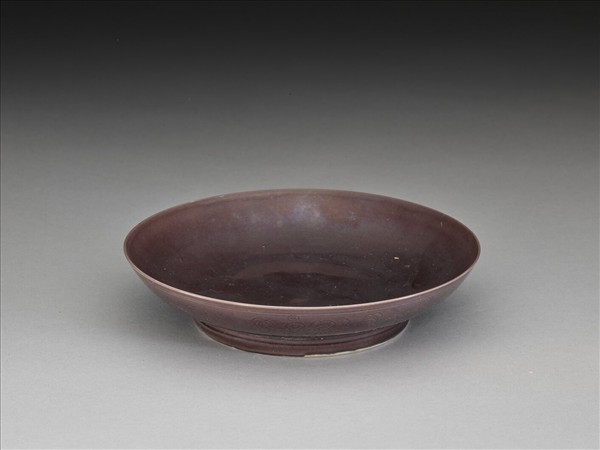 茄皮紫釉八寶紋盤