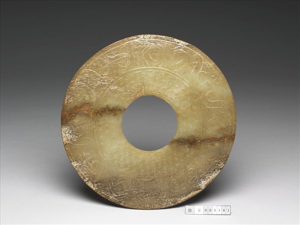 玉雙身獸紋璧（紋飾後加）