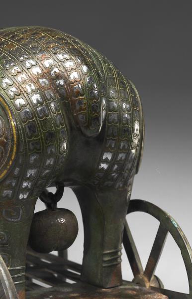 錯金銀帶輪羊尊