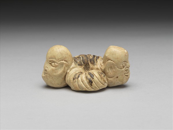 人首蛇身釉陶像