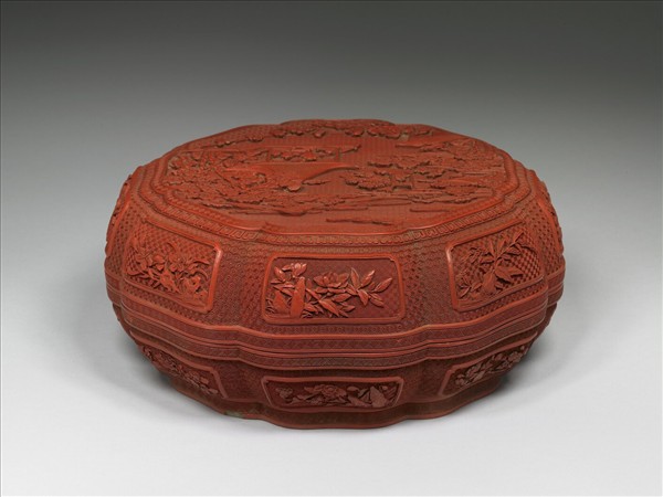 剔紅嬰戲八瓣盒