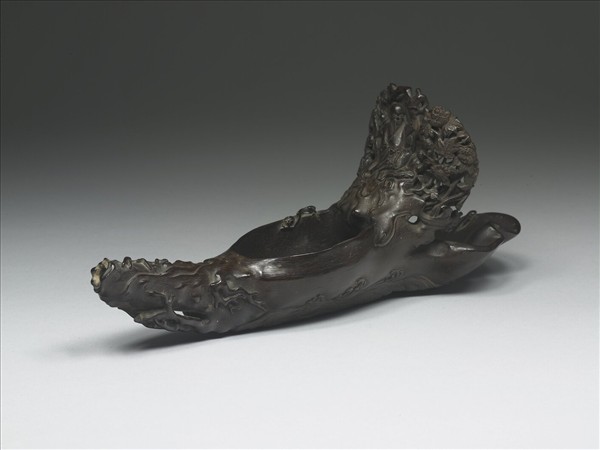 犀角雕人物乘槎