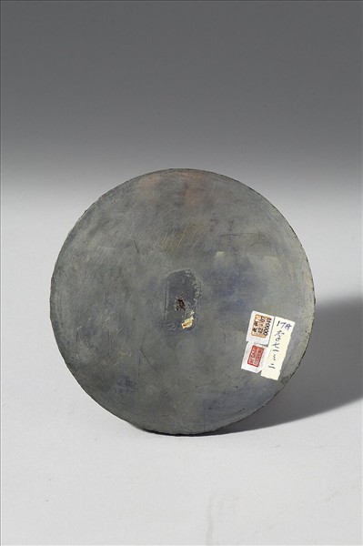 「明心」瑞花紋鏡