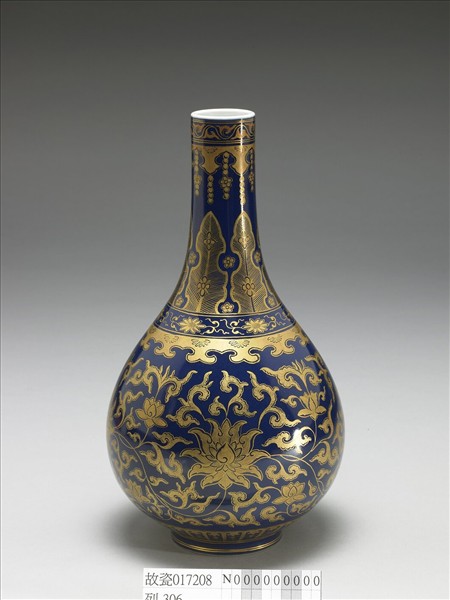 洋彩藍地金番蓮紋膽瓶