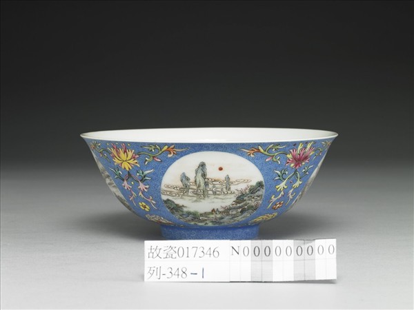洋彩藍地團花山水圖碗