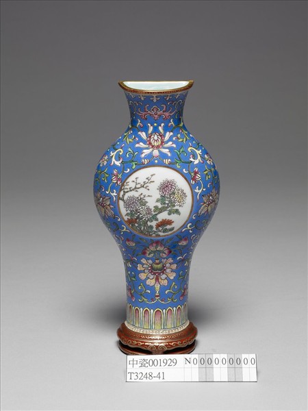 洋彩藍地花卉開光菊花紋轎瓶