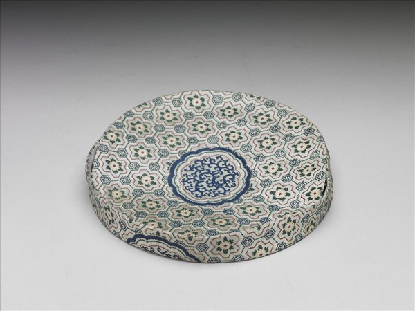 六角紋錦地團龍紋錦套