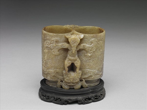 玉異獸夔龍紋雙管瓶