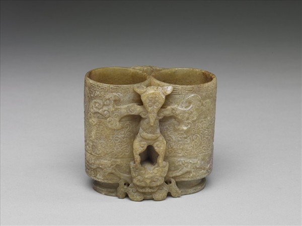 玉異獸夔龍紋雙管瓶