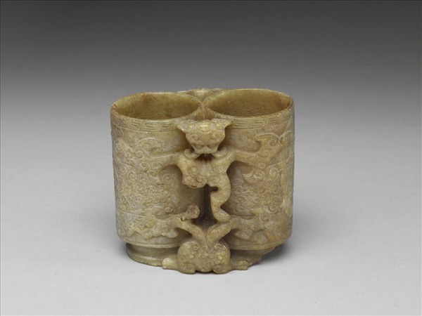 玉異獸夔龍紋雙管瓶