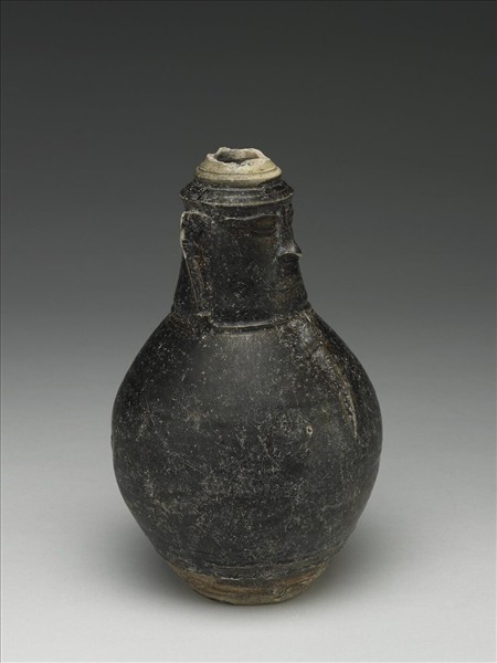 高棉 雙色釉人面瓶