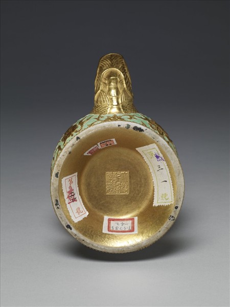 粉彩綠地描金印花八吉祥奔巴壺