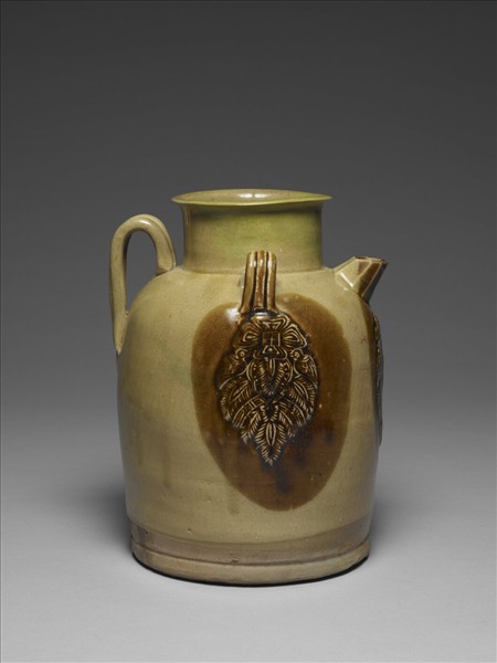 青釉貼花褐斑把壺