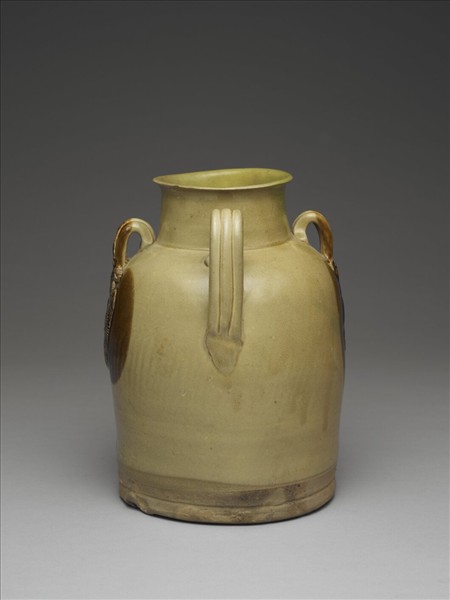 青釉貼花褐斑把壺