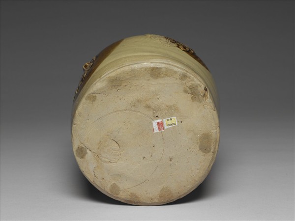 青釉貼花褐斑把壺