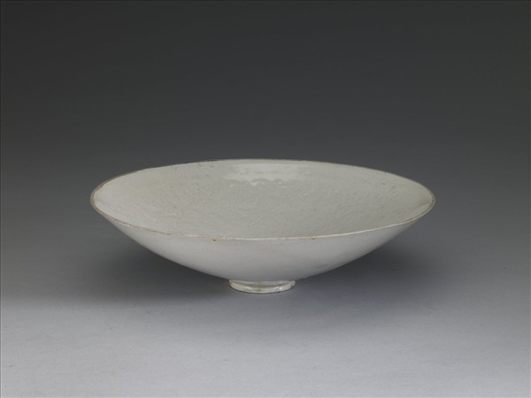 定窯 牙白印花孩兒臥榴碗