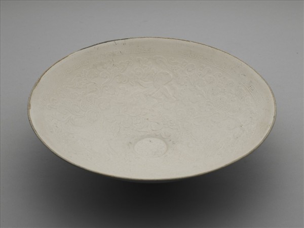 定窯 牙白印花孩兒臥榴碗